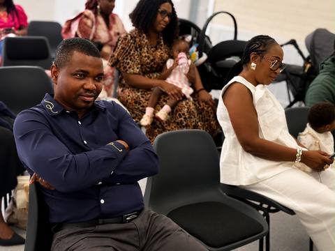 Members and families seated during a church event