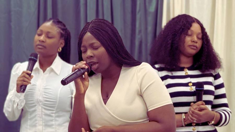 The worship team singing during a Sunday service